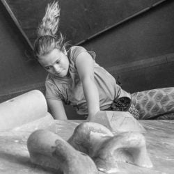 A Child Climbs in a Bouldering Gym B&W